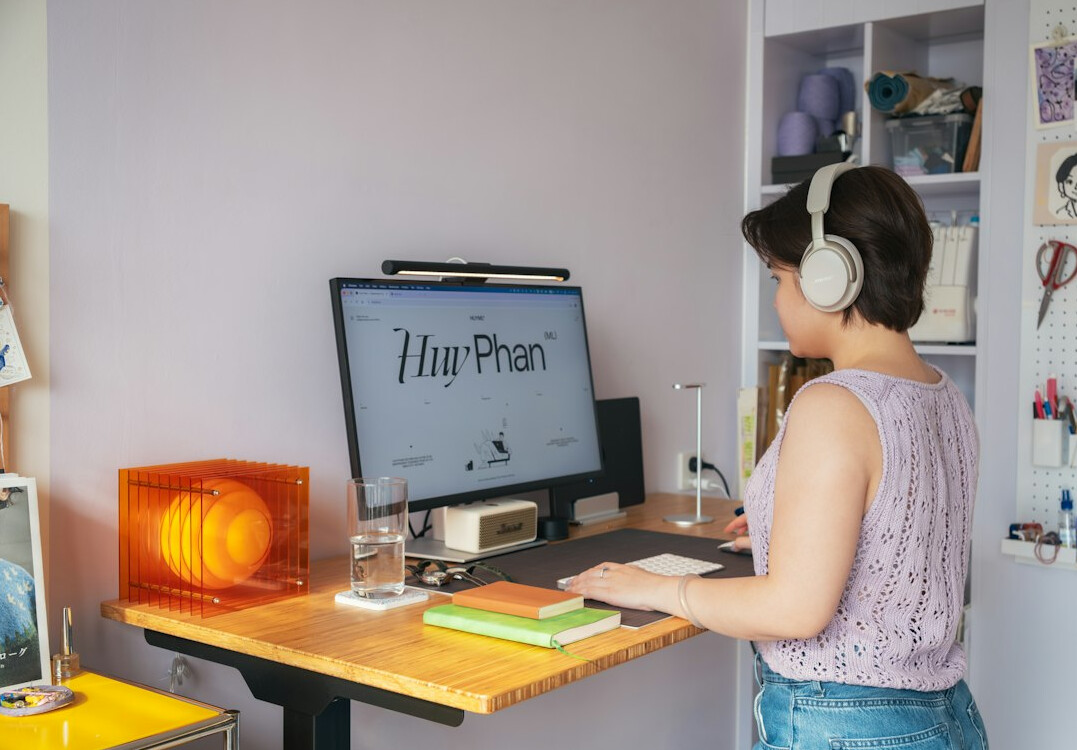 woman coding at desk