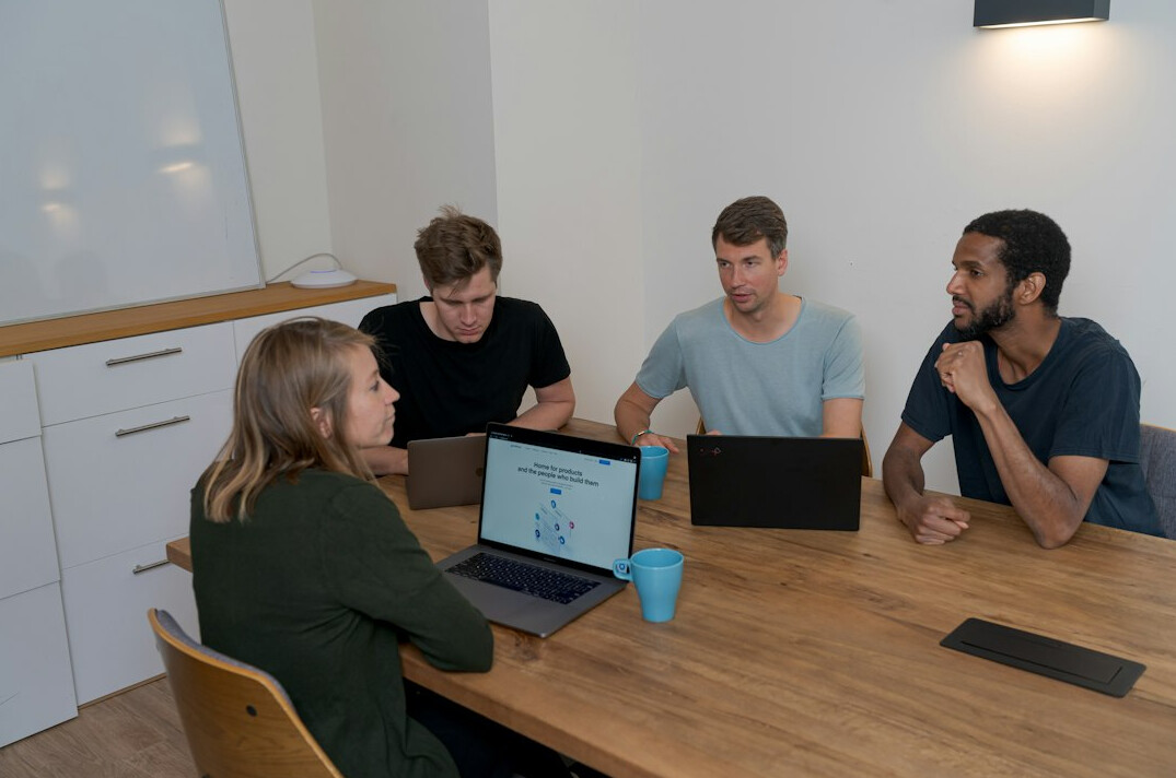 team discussing code