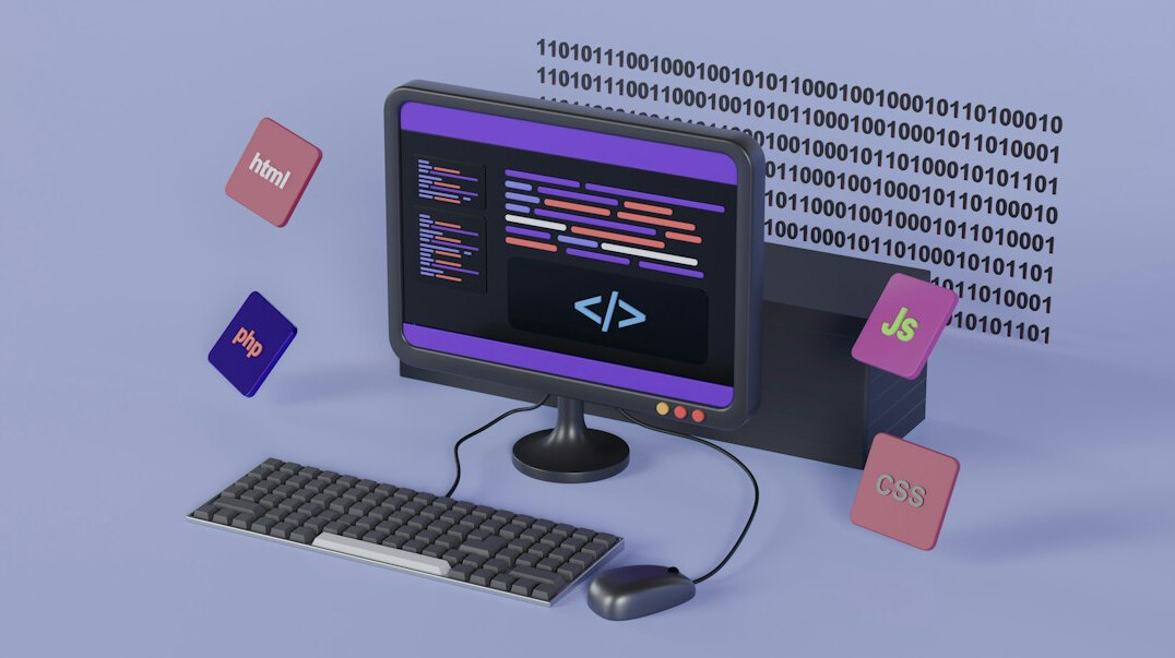 person coding on laptop